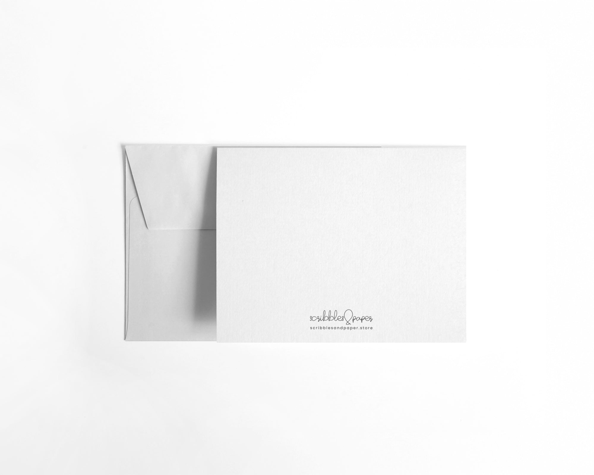 back of envelope and card in white