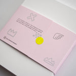 Modern pink notepad with graphic blue grid and notes heading – 100-page stationery. (back view)