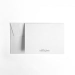 back of envelope and card in white
